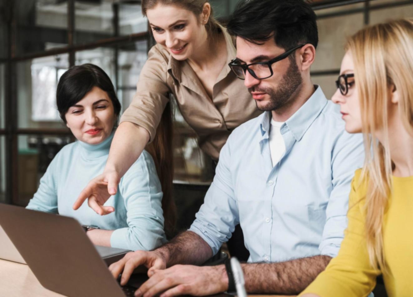 Early classroom session showing financial education materials spread across a table